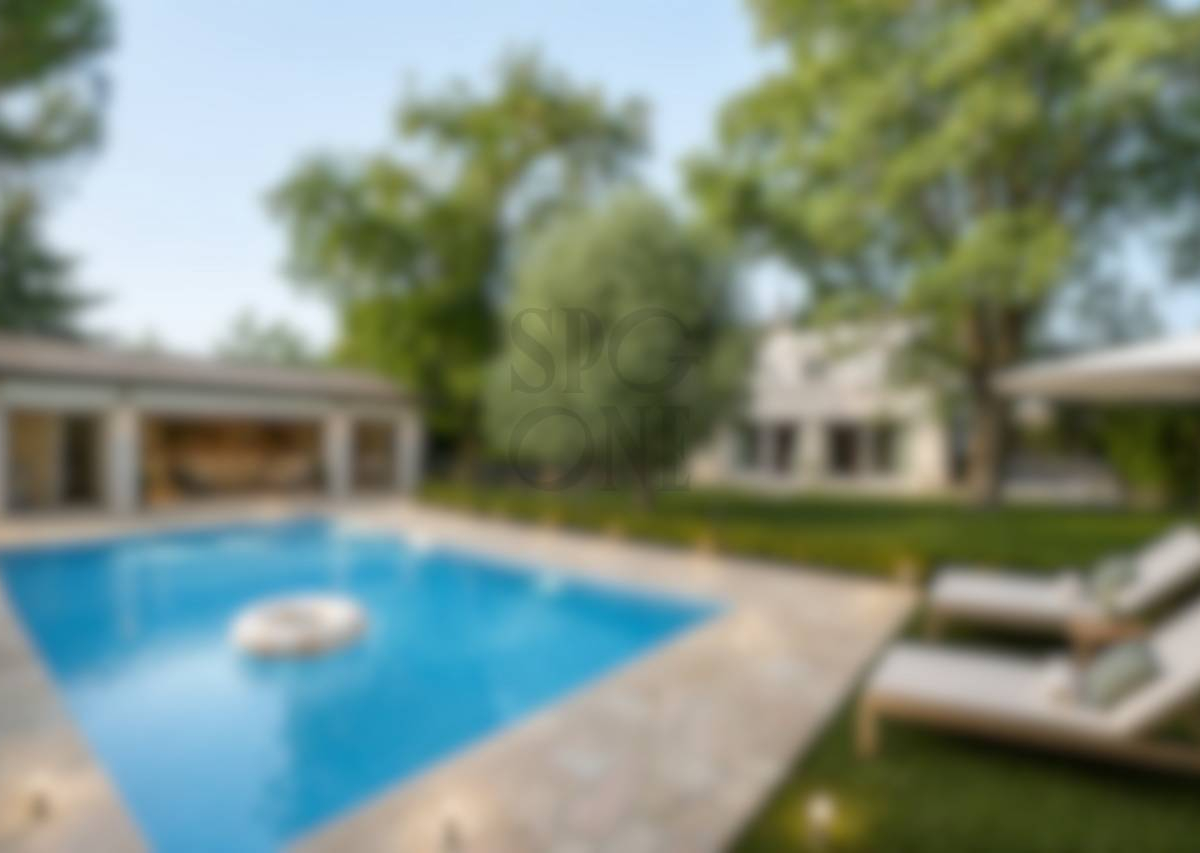 Elegant family villa with a swimming pool and pool house